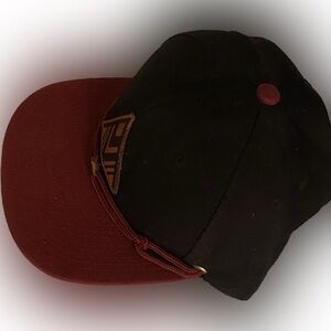 Findlay hat blue and burgundy.